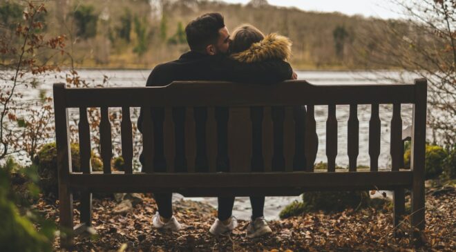 Couple in front of river